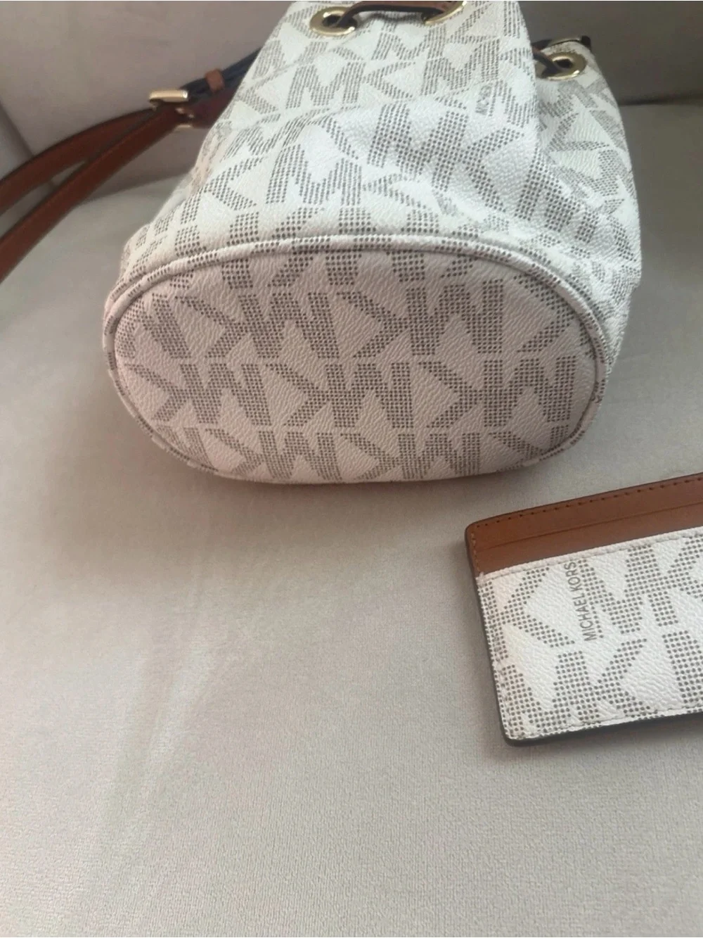 Michael Kors Cream Logo Drawstring Crossbody with Brown Trim and Gold Hardware